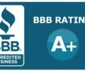 A blue and white logo featuring a bbb rating for water damage restoration.